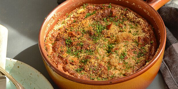 Den luftige squashgratin med bacon og sprød rasp og parmesanost på toppen.