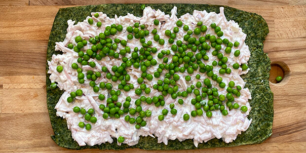 Så kommer ærterne ovenpå